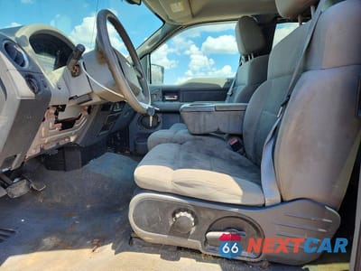 Zdjęcie 7 z 12 samochodu: 2004 FORD F150 VIN:1FTPX14504NC19670 - miniatura