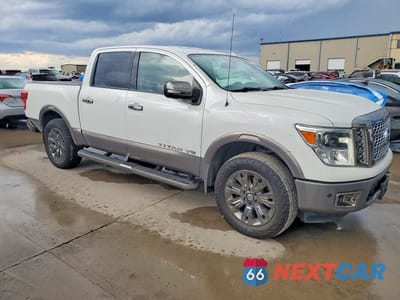 Czwarte zdjęcie samochodu z boku: 2018 NISSAN TITAN PLATINUM RESERVE VIN:1N6AA1E54JN545003 - miniatura