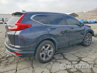 Trzecie zdjęcie samochodu z tyłu: 2019 HONDA CR-V EX VIN:7FARW1H56KE026915 - miniatura
