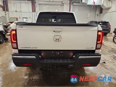 Zdjęcie 6 z 12 samochodu: 2017 HONDA RIDGELINE RTL VIN:5FPYK3F78HB002845 - miniatura