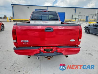 Zdjęcie 6 z 12 samochodu: 2000 FORD F150 VIN:1FTRX18L5YKB02966 - miniatura