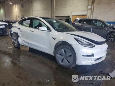 Czwarte zdjęcie samochodu z boku: 2019 TESLA MODEL 3 VIN:5YJ3E1EBXKF442299 - miniatura