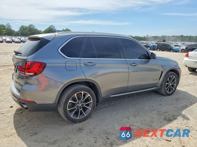 Trzecie zdjęcie samochodu z tyłu: 2014 BMW X5 SDRIVE35I VIN:5UXKR2C52E0H31359 - miniatura