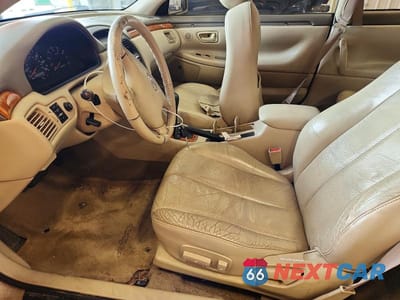 Zdjęcie 7 z 12 samochodu: 2002 TOYOTA CAMRY SOLARA SLE V6 VIN:2T1CF28P02C590816 - miniatura