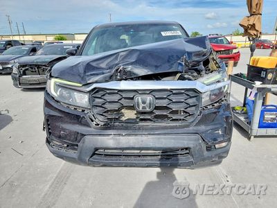 Piąte zdjęcie samochodu w środku: 2023 HONDA PASSPORT EXL VIN:5FNYF8H51PB009513 - miniatura