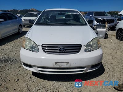Piąte zdjęcie samochodu w środku: 2003 TOYOTA COROLLA CE VIN:1NXBR32E73Z006752 - miniatura