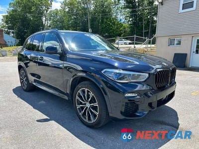 Czwarte zdjęcie samochodu z boku: 2021 BMW X5 XDRIVE45E VIN:5UXTA6C07M9E53785 - miniatura
