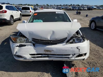 Piąte zdjęcie samochodu w środku: 2003 TOYOTA CAMRY LE VIN:4T1BE32K23U213454 - miniatura