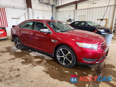 Czwarte zdjęcie samochodu z boku: 2014 FORD TAURUS LIMITED VIN:1FAHP2F86EG130750 - miniatura