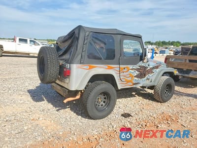Trzecie zdjęcie samochodu z tyłu: 1997 JEEP WRANGLER / TJ SPORT VIN:1J4FY19S6VP425115 - miniatura