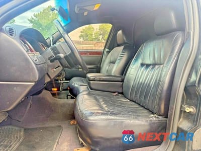 Zdjęcie 14 z 14 samochodu: 2005 LINCOLN TOWN CAR EXECUTIVE VIN:1L1FM88W85Y609574 - miniatura