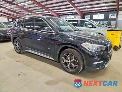 Czwarte zdjęcie samochodu z boku: 2018 BMW X1 XDRIVE28I VIN:WBXHT3C36J5K28366 - miniatura