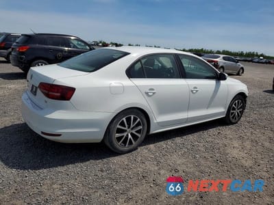 Trzecie zdjęcie samochodu z tyłu: 2016 VOLKSWAGEN JETTA COMFORTLINE VIN:3VWD07AJ7GM388642 - miniatura
