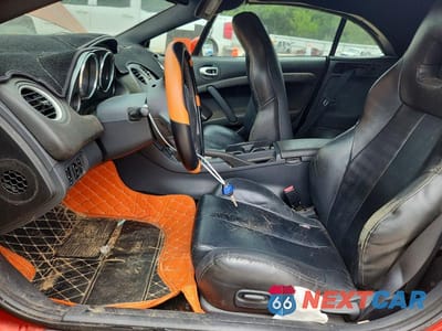 Zdjęcie 7 z 12 samochodu: 2012 MITSUBISHI ECLIPSE SPYDER GS VIN:4A37L5EFXCE005842 - miniatura