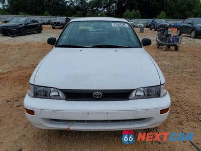 Piąte zdjęcie samochodu w środku: 1994 TOYOTA COROLLA BASE VIN:1NXAE04B5RZ151483 - miniatura