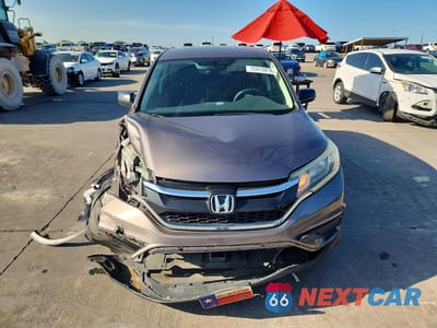 Piąte zdjęcie samochodu w środku: 2015 HONDA CR-V LX VIN:3CZRM3H32FG709779 - miniatura