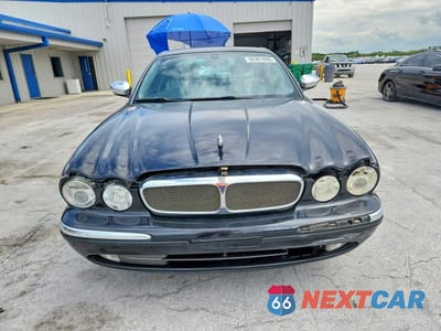 Piąte zdjęcie samochodu w środku: 2004 JAGUAR VANDENPLAS VIN:SAJWA74CX4SG15058 - miniatura