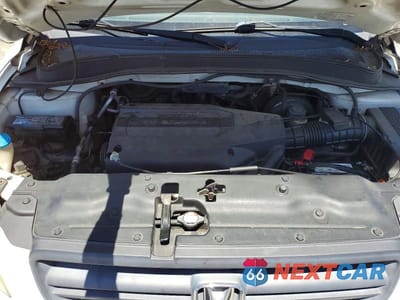Zdjęcie 12 z 13 samochodu: 2004 HONDA PILOT EXL VIN:2HKYF18614H615441 - miniatura