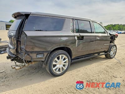 Trzecie zdjęcie samochodu z tyłu: 2021 CHEVROLET SUBURBAN K1500 HIGH COUNTRY VIN:1GNSKGKL8MR159683 - miniatura