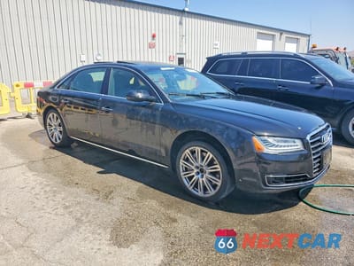 Czwarte zdjęcie samochodu z boku: 2016 AUDI A8 L QUATTRO VIN:WAU34AFD6GN010477 - miniatura