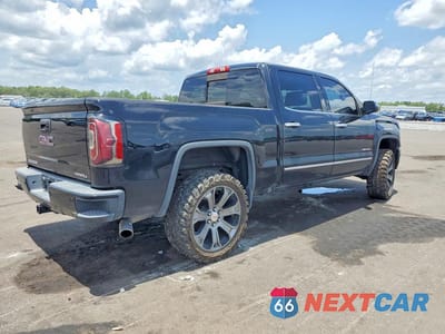 Trzecie zdjęcie samochodu z tyłu: 2017 GMC SIERRA K1500 DENALI VIN:3GTU2PEJ2HG182619 - miniatura