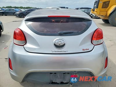 Zdjęcie 6 z 12 samochodu: 2013 HYUNDAI VELOSTER BASE VIN:KMHTC6AD0DU117838 - miniatura