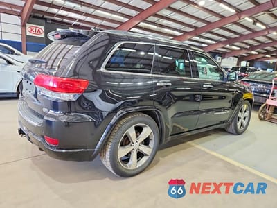 Trzecie zdjęcie samochodu z tyłu: 2015 JEEP GRAND CHEROKEE OVERLAND VIN:1C4RJFCG8FC859876 - miniatura