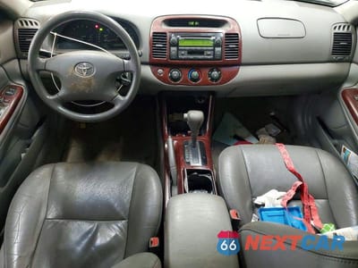 Zdjęcie 8 z 12 samochodu: 2003 TOYOTA CAMRY LE VIN:JTDBE32K330227956 - miniatura
