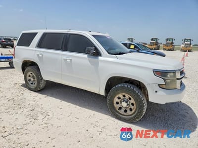 Czwarte zdjęcie samochodu z boku: 2017 CHEVROLET TAHOE SPECIAL VIN:1GNSKFEC9HR271386 - miniatura