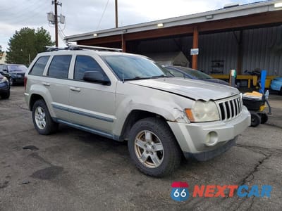 Czwarte zdjęcie samochodu z boku: 2007 JEEP GRAND CHEROKEE LAREDO VIN:1J8GR48KX7C606148 - miniatura