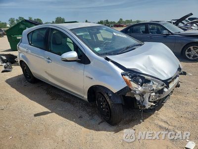 Czwarte zdjęcie samochodu z boku: 2015 TOYOTA PRIUS C ONE VIN:JTDKDTB34F1577025 - miniatura