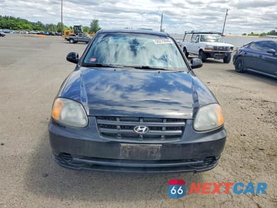 Piąte zdjęcie samochodu w środku: 2005 HYUNDAI ACCENT GS VIN:KMHCG35C95U330261 - miniatura