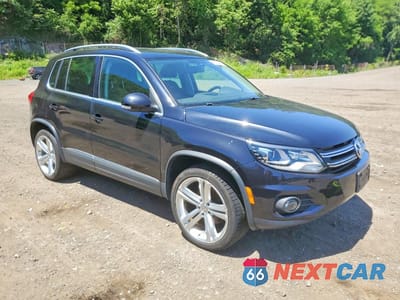 Czwarte zdjęcie samochodu z boku: 2016 VOLKSWAGEN TIGUAN S VIN:WVGBV7AX5GW558816 - miniatura