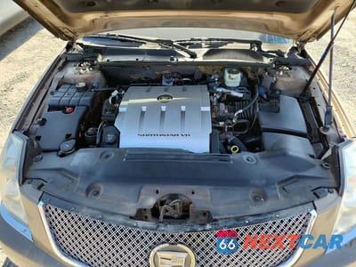 Zdjęcie 11 z 12 samochodu: 2006 CADILLAC DTS VIN:1G6KD57Y06U179604 - miniatura