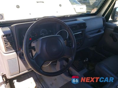 Zdjęcie 8 z 12 samochodu: 1998 JEEP WRANGLER VIN:1J4FY29P5WP765620 - miniatura