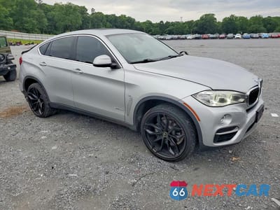 Czwarte zdjęcie samochodu z boku: 2016 BMW X6 SDRIVE35I VIN:5UXKU0C5XG0F93060 - miniatura