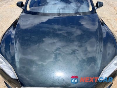 Zdjęcie 11 z 12 samochodu: 2013 TESLA MODEL S VIN:5YJSA1AC1DFP10732 - miniatura