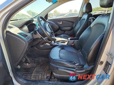 Zdjęcie 7 z 13 samochodu: 2011 HYUNDAI TUCSON GLS VIN:KM8JUCAC4BU300151 - miniatura