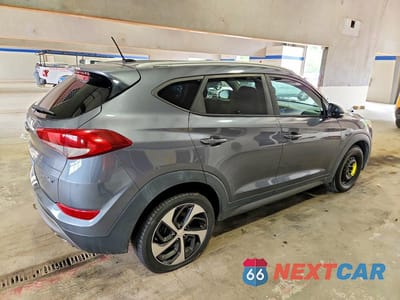 Trzecie zdjęcie samochodu z tyłu: 2016 HYUNDAI TUCSON SPORT VIN:KM8J33A22GU183395 - miniatura
