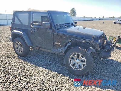 Czwarte zdjęcie samochodu z boku: 2017 JEEP WRANGLER SPORT VIN:1C4AJWAG6HL568697 - miniatura