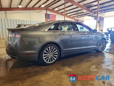 Trzecie zdjęcie samochodu z tyłu: 2017 LINCOLN MKZ SELECT VIN:3LN6L5DC8HR624428 - miniatura