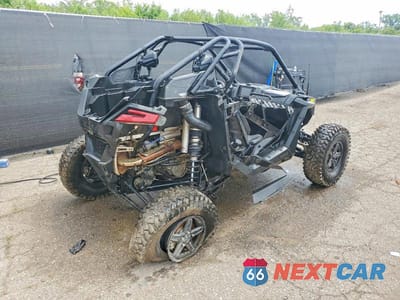 Czwarte zdjęcie samochodu z boku: 2024 POLARIS RZR TURBO R SPORT VIN:3NSGAE926RG066105 - miniatura