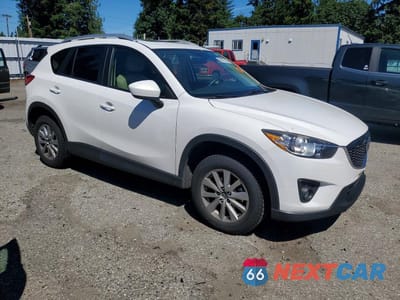 Czwarte zdjęcie samochodu z boku: 2015 MAZDA CX-5 TOURING VIN:JM3KE4CY2F0442894 - miniatura