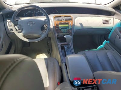 Zdjęcie 8 z 12 samochodu: 2002 TOYOTA AVALON XLS VIN:4T1BF28B22U253272 - miniatura