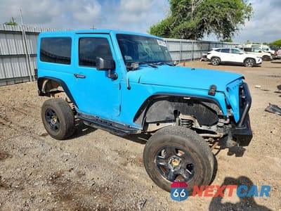 Czwarte zdjęcie samochodu z boku: 2018 JEEP WRANGLER SPORT VIN:1C4AJWAG7JL874300 - miniatura