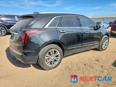 Trzecie zdjęcie samochodu z tyłu: 2023 CADILLAC XT5 PREMIUM LUXURY VIN:1GYKNDRS4PZ166205 - miniatura