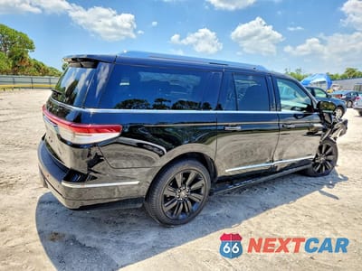 Trzecie zdjęcie samochodu z tyłu: 2023 LINCOLN NAVIGATOR L RESERVE VIN:5LMJJ3LG9PEL11220 - miniatura