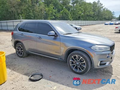 Czwarte zdjęcie samochodu z boku: 2014 BMW X5 SDRIVE35I VIN:5UXKR2C52E0H31359 - miniatura