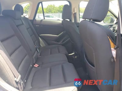 Zdjęcie 10 z 12 samochodu: 2016 MAZDA CX-5 TOURING VIN:JM3KE2CYXG0900641 - miniatura