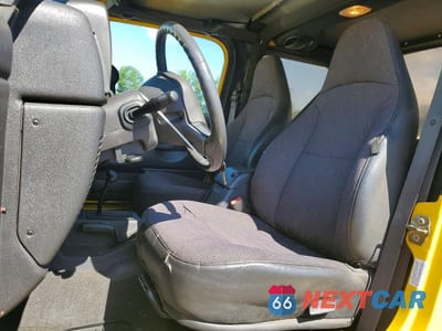 Zdjęcie 7 z 13 samochodu: 2001 JEEP WRANGLER / TJ SPORT VIN:1J4FA49S51P325149 - miniatura